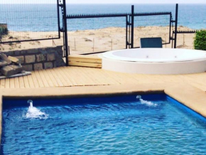 Отель Casa y Cabaña en playa Guanaqueros  Кокимбо